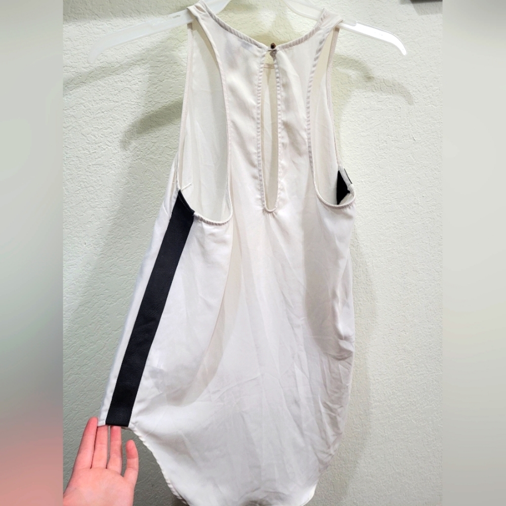 White Forever21 tank top with leather side cuts